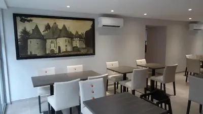 Coin salon dans l'établissement Parc Hôtel Pompadour