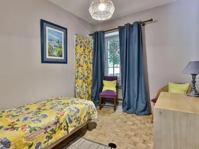 Un ou plusieurs lits dans un hébergement de l'établissement Holiday Home La Colinoise by Interhome