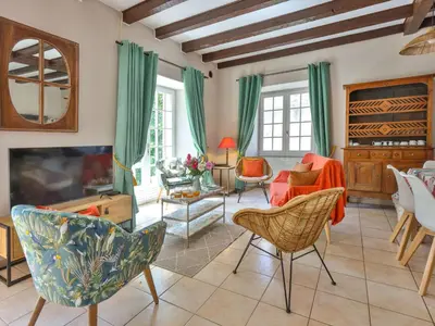 Télévision ou salle de divertissement dans l'établissement Holiday Home La Colinoise by Interhome