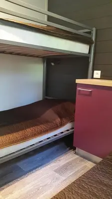 Un ou plusieurs lits dans un hébergement de l'établissement Camping Les Vernieres La Bourboule Sancy