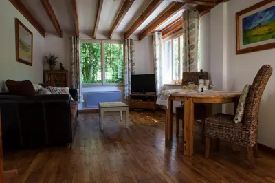 Télévision ou salle de divertissement dans l'établissement Moulin De Villesaint