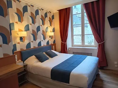 Un ou plusieurs lits dans un hébergement de l'établissement Le Pavillon Saint-Martin