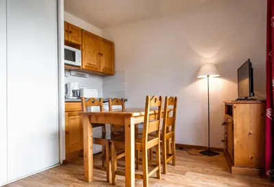 Cuisine ou kitchenette dans l'établissement Résidence Le Bois de la Reine