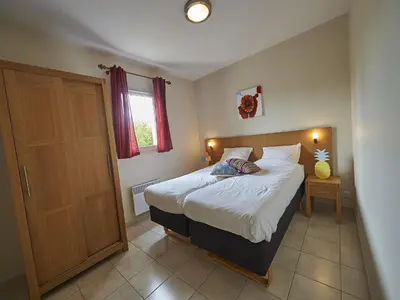 Un ou plusieurs lits dans un hébergement de l'établissement Villa in Lanzac with Private Garden