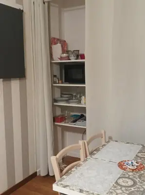 Télévision ou salle de divertissement dans l'établissement Le nid de mésanges