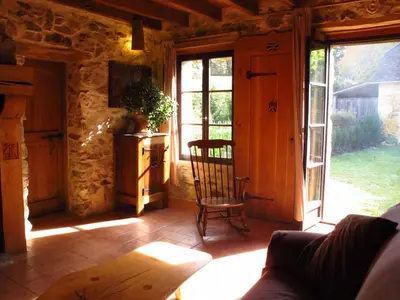 Coin salon dans l'établissement Cottage in Dordogne
