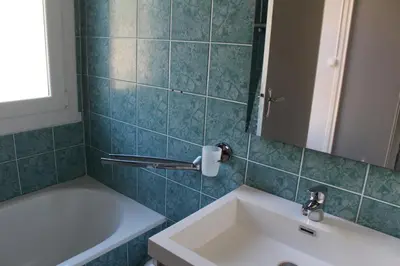 Salle de bains dans l'établissement Les Gîtes du Paradis