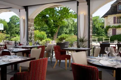 Restaurant ou autre lieu de restauration dans l'établissement Logis hotel les flots bleus