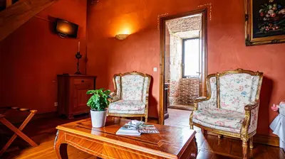 Coin salon dans l'établissement Château Hôtel La Terrasse - Teritoria