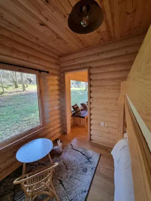 Coin salon dans l'établissement Les Lodges Du Reynou