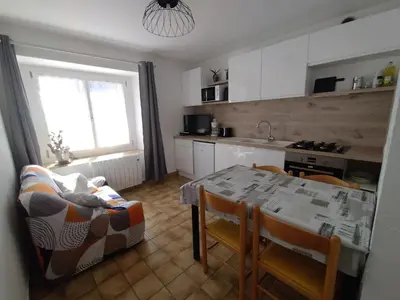 Cuisine ou kitchenette dans l'établissement Les Appartements de Johann