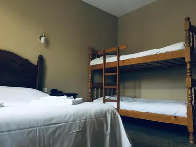 Un ou plusieurs lits dans un hébergement de l'établissement Le Brunet