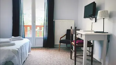 Un ou plusieurs lits dans un hébergement de l'établissement Le Brunet
