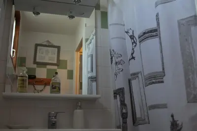 Salle de bains dans l'établissement Chez Marraine
