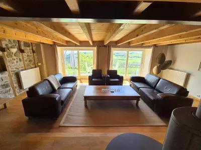 Coin salon dans l'établissement La Grange - Gite Mur de Barrez
