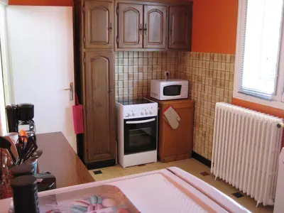 Cuisine ou kitchenette dans l'établissement La Petite Cerise