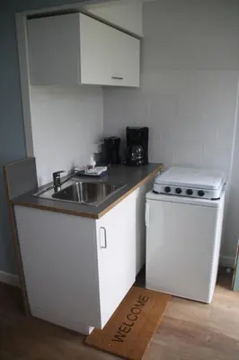 Cuisine ou kitchenette dans l'établissement Apartment Fleur de Lys Bleue
