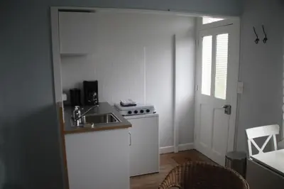 Cuisine ou kitchenette dans l'établissement Apartment Fleur de Lys Bleue