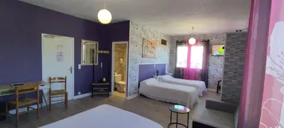 Un ou plusieurs lits dans un hébergement de l'établissement Hotel Belle Vue