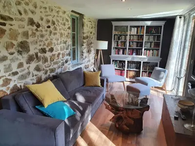 Coin salon dans l'établissement Gite de la Genevrière