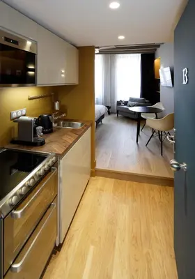 Cuisine ou kitchenette dans l'établissement Les Maisons du Pont - Charme & Caractère