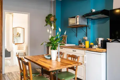 Cuisine ou kitchenette dans l'établissement Dupain & Dubeurre Appart'hôtel - Parking en supp