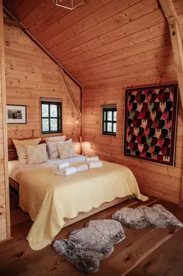 Un ou plusieurs lits dans un hébergement de l'établissement Cabane Rouge-Gorge