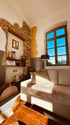 Coin salon dans l'établissement Villa De Vacances l'Ancienne Ecole Troche