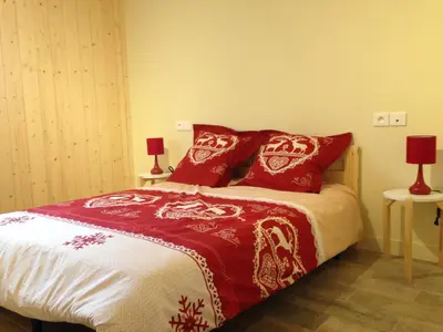 Un ou plusieurs lits dans un hébergement de l'établissement Le chalet des Patures