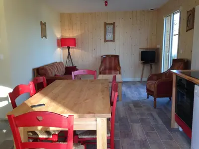 Télévision ou salle de divertissement dans l'établissement Le chalet des Patures