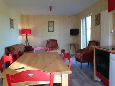 Télévision ou salle de divertissement dans l'établissement Le chalet des Patures