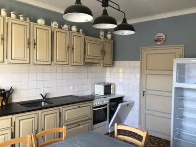 Cuisine ou kitchenette dans l'établissement Les Glycines