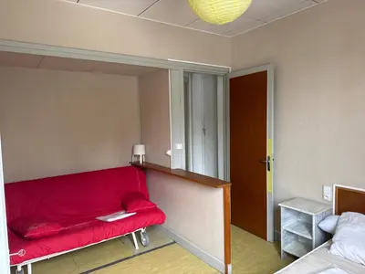 Un ou plusieurs lits dans un hébergement de l'établissement Le tourbillon nouveau