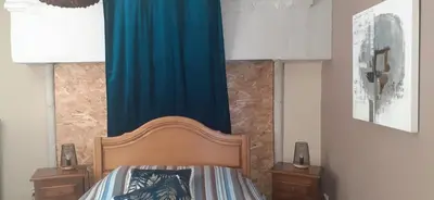 Un ou plusieurs lits dans un hébergement de l'établissement La Maison De Béatrice