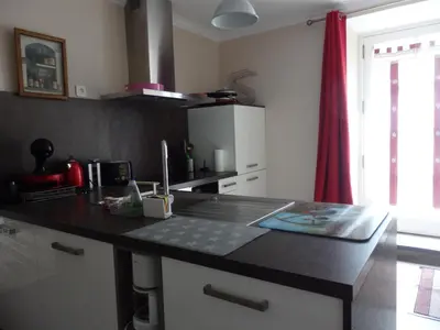 Cuisine ou kitchenette dans l'établissement La Maison De Béatrice