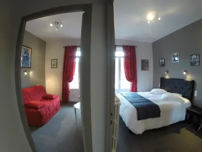 Un ou plusieurs lits dans un hébergement de l'établissement Hôtel de l'Aviation