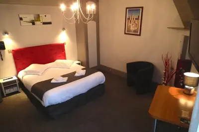 Un ou plusieurs lits dans un hébergement de l'établissement Hôtel de l'Aviation