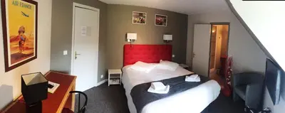 Un ou plusieurs lits dans un hébergement de l'établissement Hôtel de l'Aviation