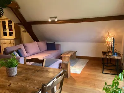 Coin salon dans l'établissement Le Chêne Doux