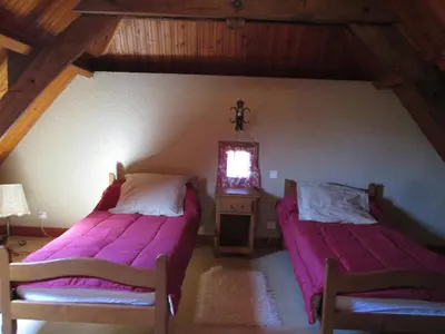 Un ou plusieurs lits dans un hébergement de l'établissement Holiday Home La Grange by Interhome