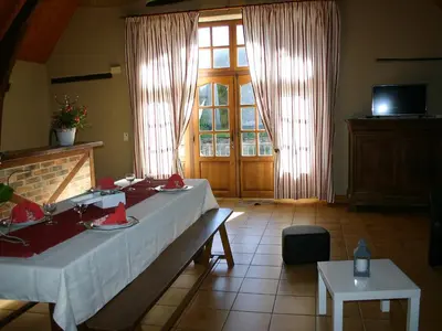 Télévision ou salle de divertissement dans l'établissement Holiday Home La Grange by Interhome