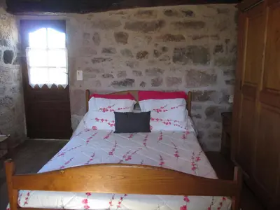 Un ou plusieurs lits dans un hébergement de l'établissement Holiday Home Le Pigeonnier by Interhome