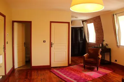 Coin salon dans l'établissement Auberge Les Volcans