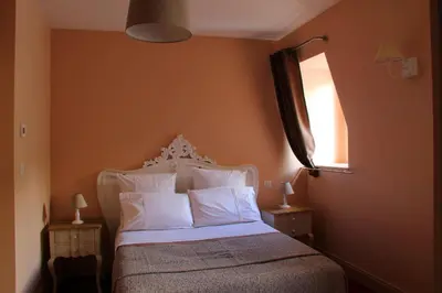 Un ou plusieurs lits dans un hébergement de l'établissement Auberge Les Volcans