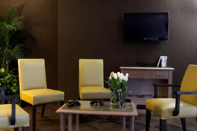 Télévision ou salle de divertissement dans l'établissement Best Western Plus Richelieu