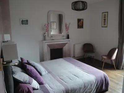 Un ou plusieurs lits dans un hébergement de l'établissement Le Relais des Capucines