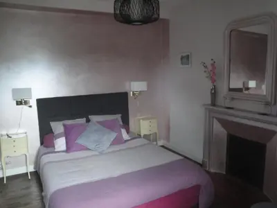 Un ou plusieurs lits dans un hébergement de l'établissement Le Relais des Capucines
