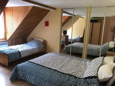 Un ou plusieurs lits dans un hébergement de l'établissement Résidence Les Cascades