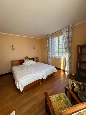 Un ou plusieurs lits dans un hébergement de l'établissement Auberge des Ruines de Merle