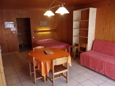 Coin salon dans l'établissement Le Champbourguet